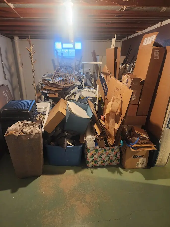 Roll-off dumpster container at job site for Yard Waste Dumpster Rental in Exeter